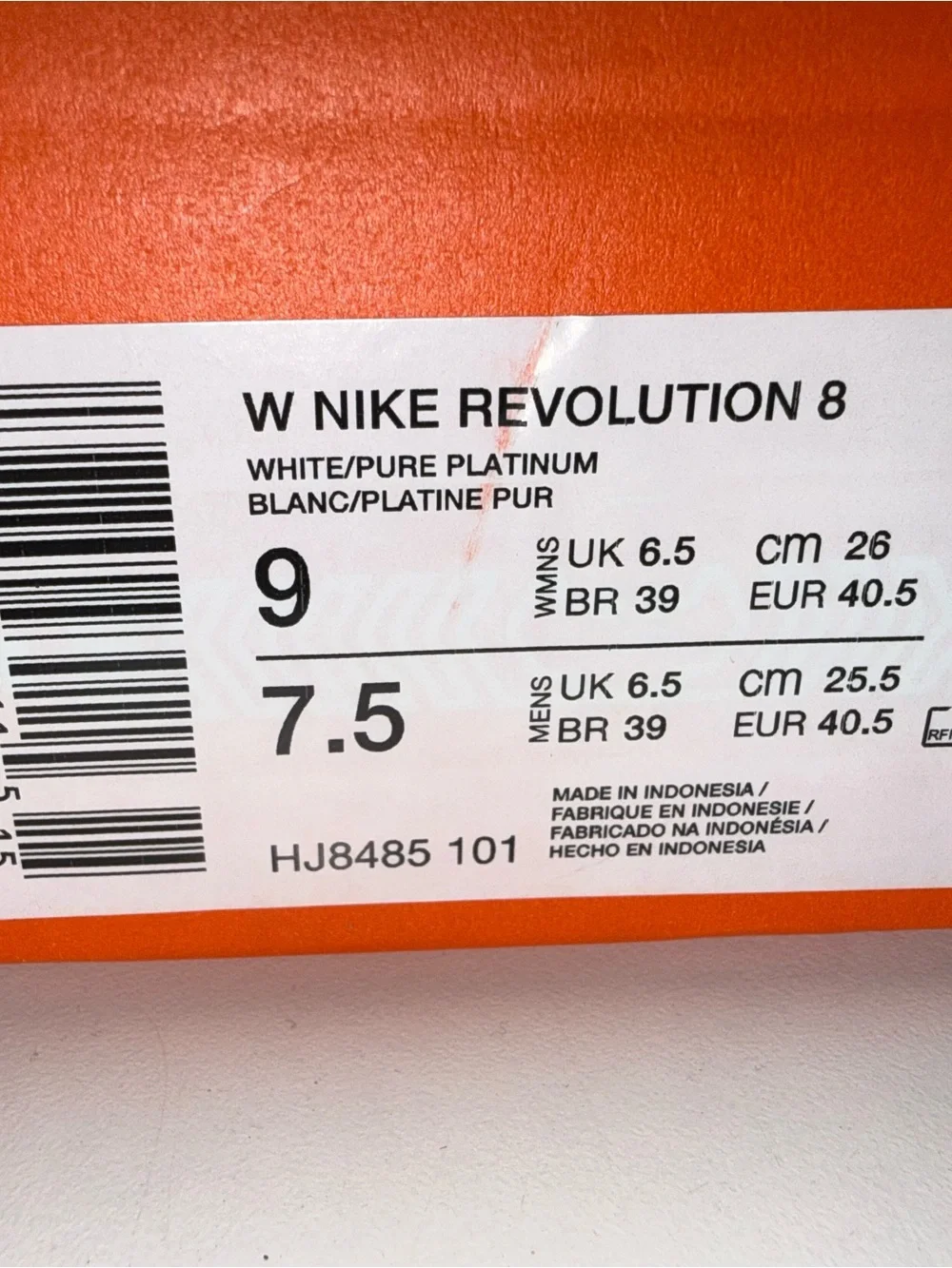 Nike Women’s White Athletic Running Shoes with Gray Swoosh